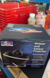 13-in-1 Galaxy Projector Lamp displaying colorful rotating planets and star patterns on a dark background.