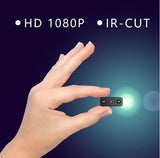 Small 1080P Full HD camcorder with infrared night vision, motion detection, compact design, suitable for discreet video recording.